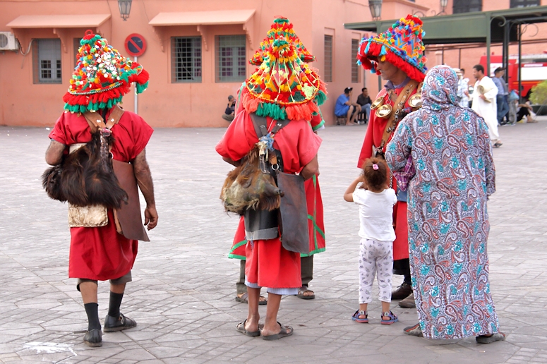 Ex Water Carriers pose for tourist photos