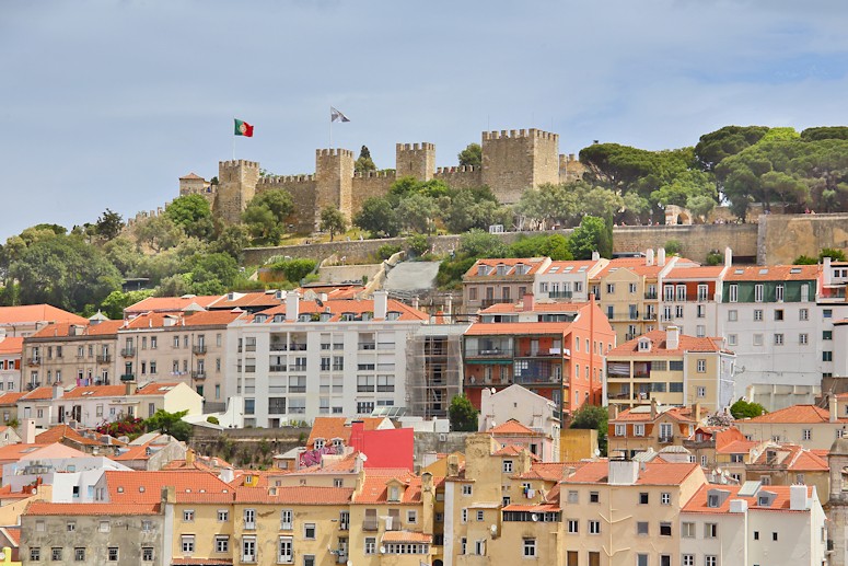 The higher portion of Alfama, the old quarter of Lisbon, with St George's castle at the peak