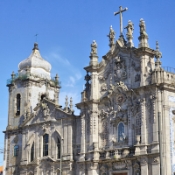 Right: 1750 Rococo Church of Carmo in Porto, Left: 1625 Baroque Church of Carmelitas, Porto