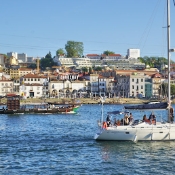 Calem and Sandeman in view across the Douro River are famous for their wine tasting and visits to their cellars