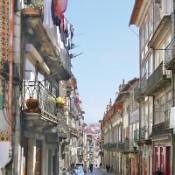  In the old quarter of Porto, Portugal - by the 13th century the city had grown, such that the walls were taken down and  areas along the river like the Ribeira were occupied