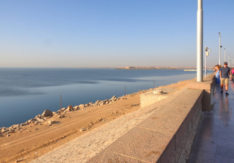 Standing on the Aswan High Dam, with Lake Nasser to the left, Egypt